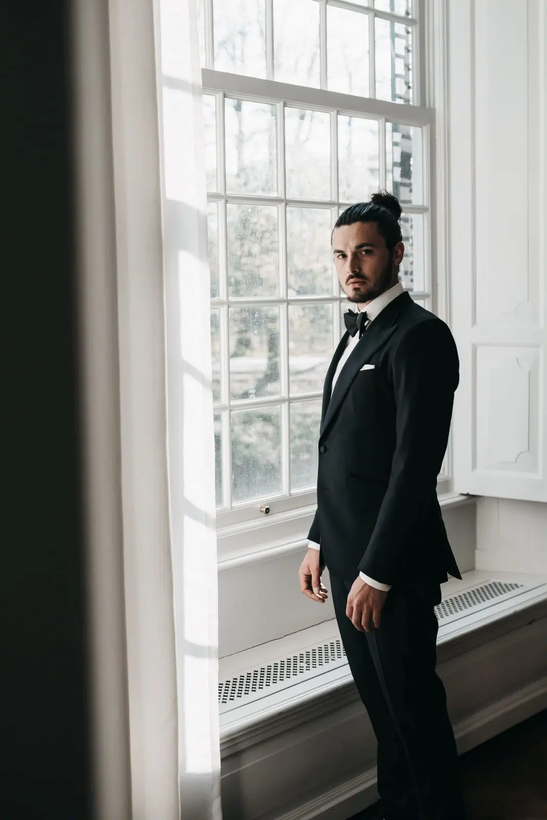 raam man bun smoking black tie | Michael & Giso